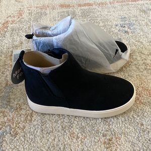 Black high top sneakers with zipper